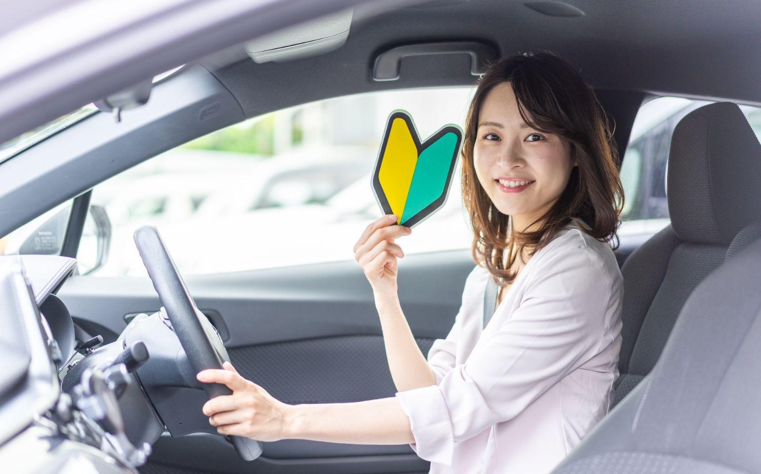 初心者マークをもつ女性